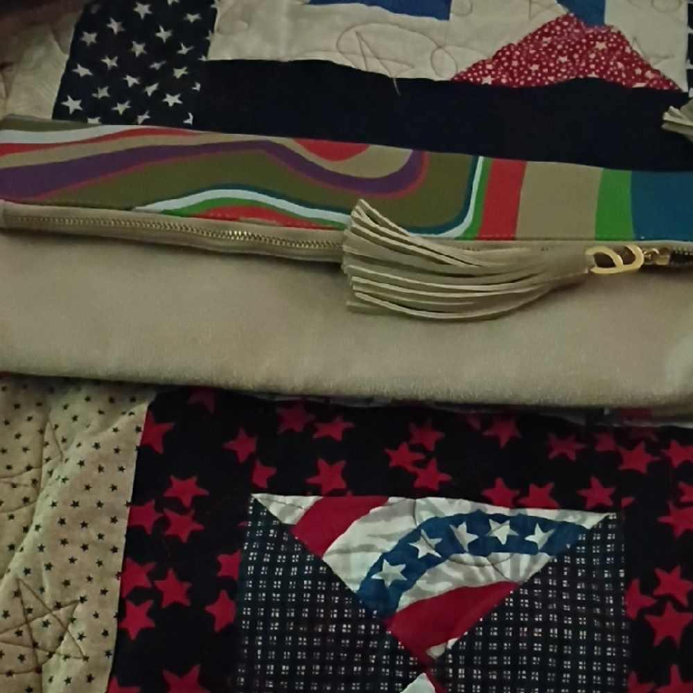 Neutral Beige Tassel Clutch with Multicolor Accent